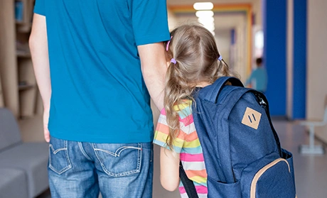 father taking his nervous daughter to school