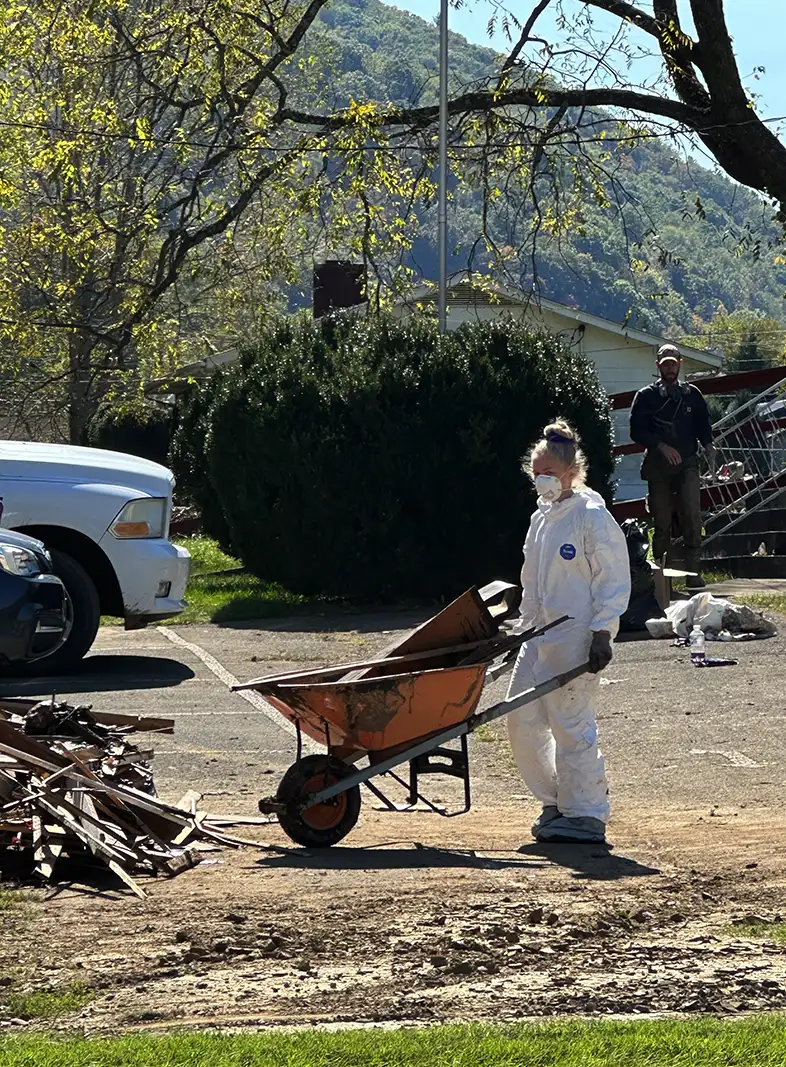cleaning hurricane wreckage outside