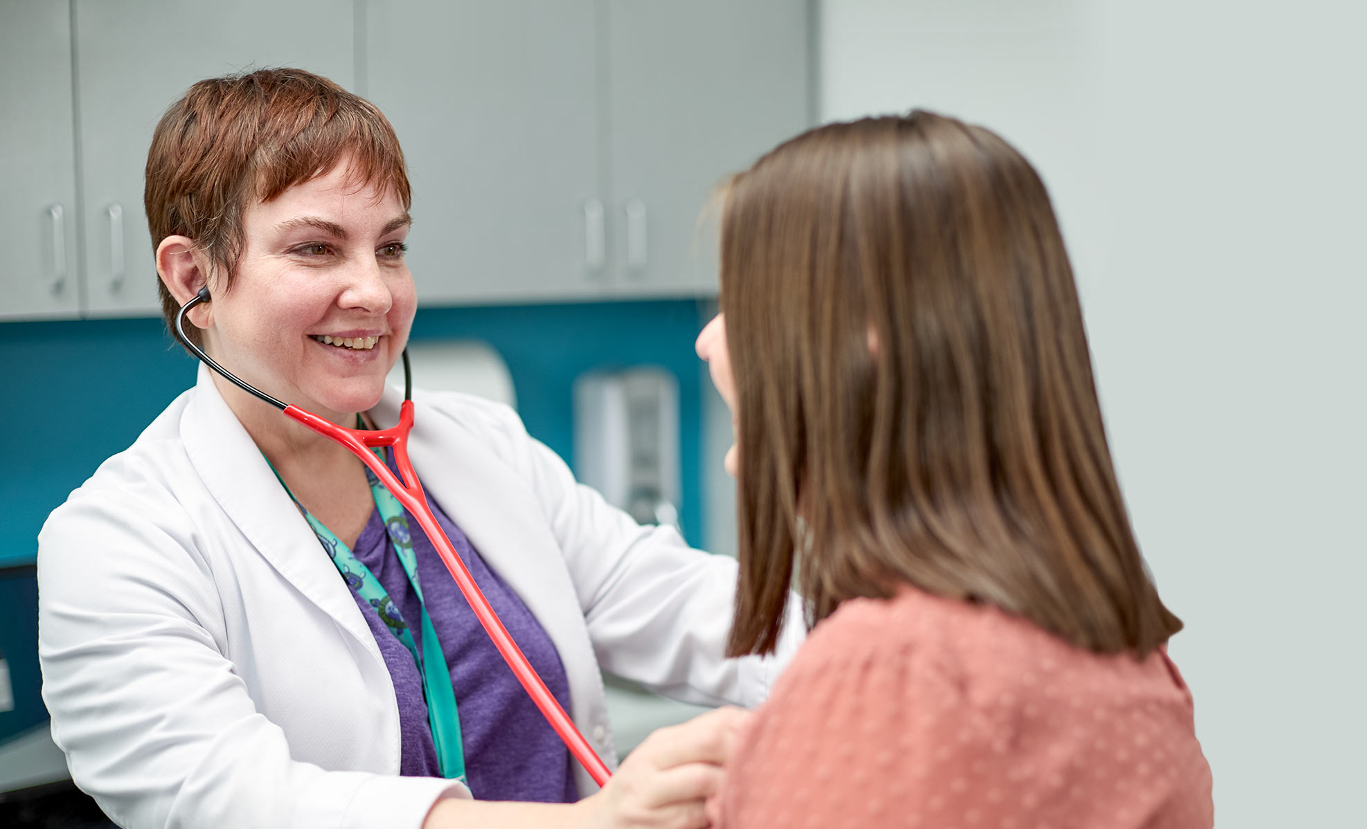 Dr. Partain and patient during exam