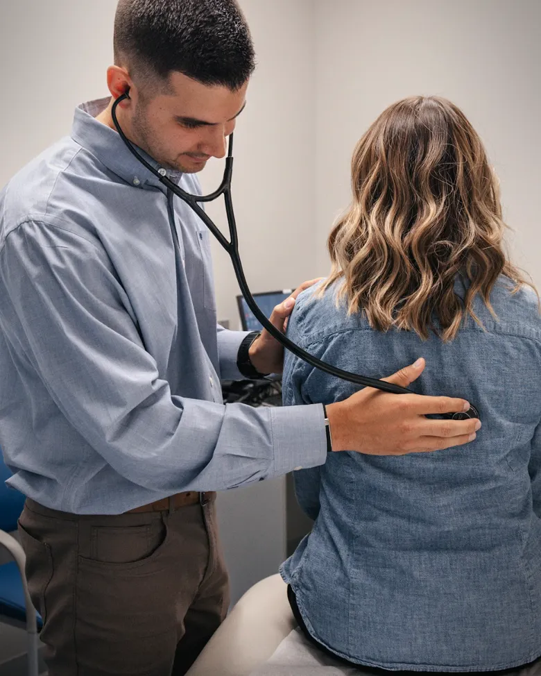 Dr. Kegley examining a patient