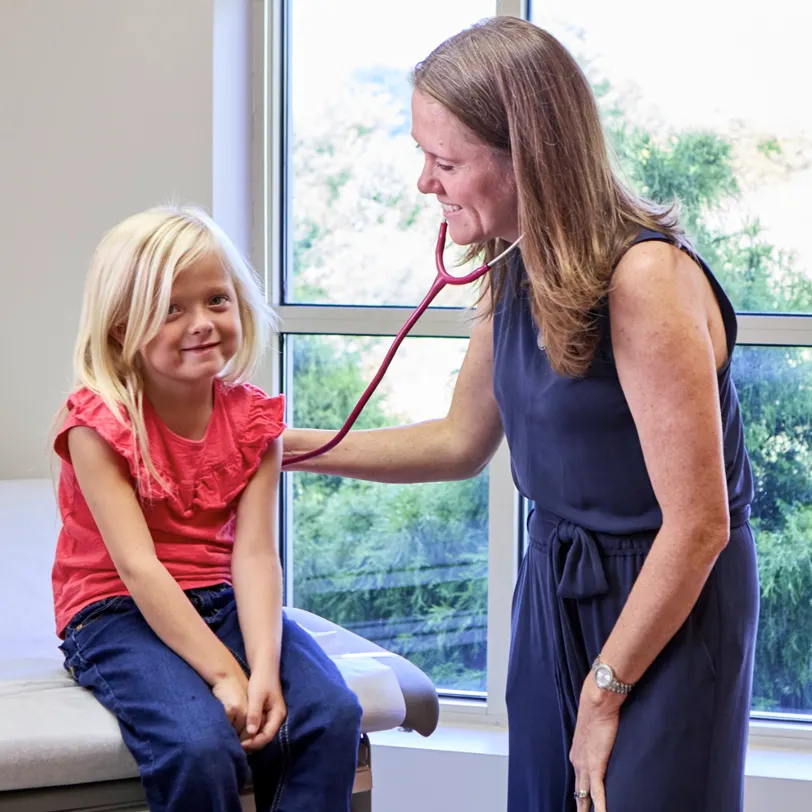 Doctor high-fiving child