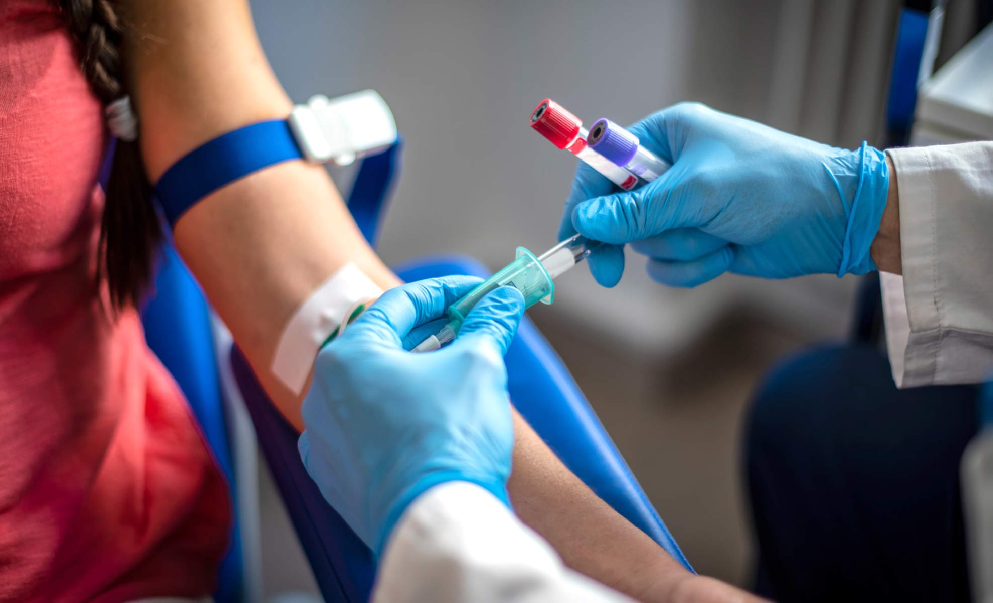 person getting blood drawn for tests
