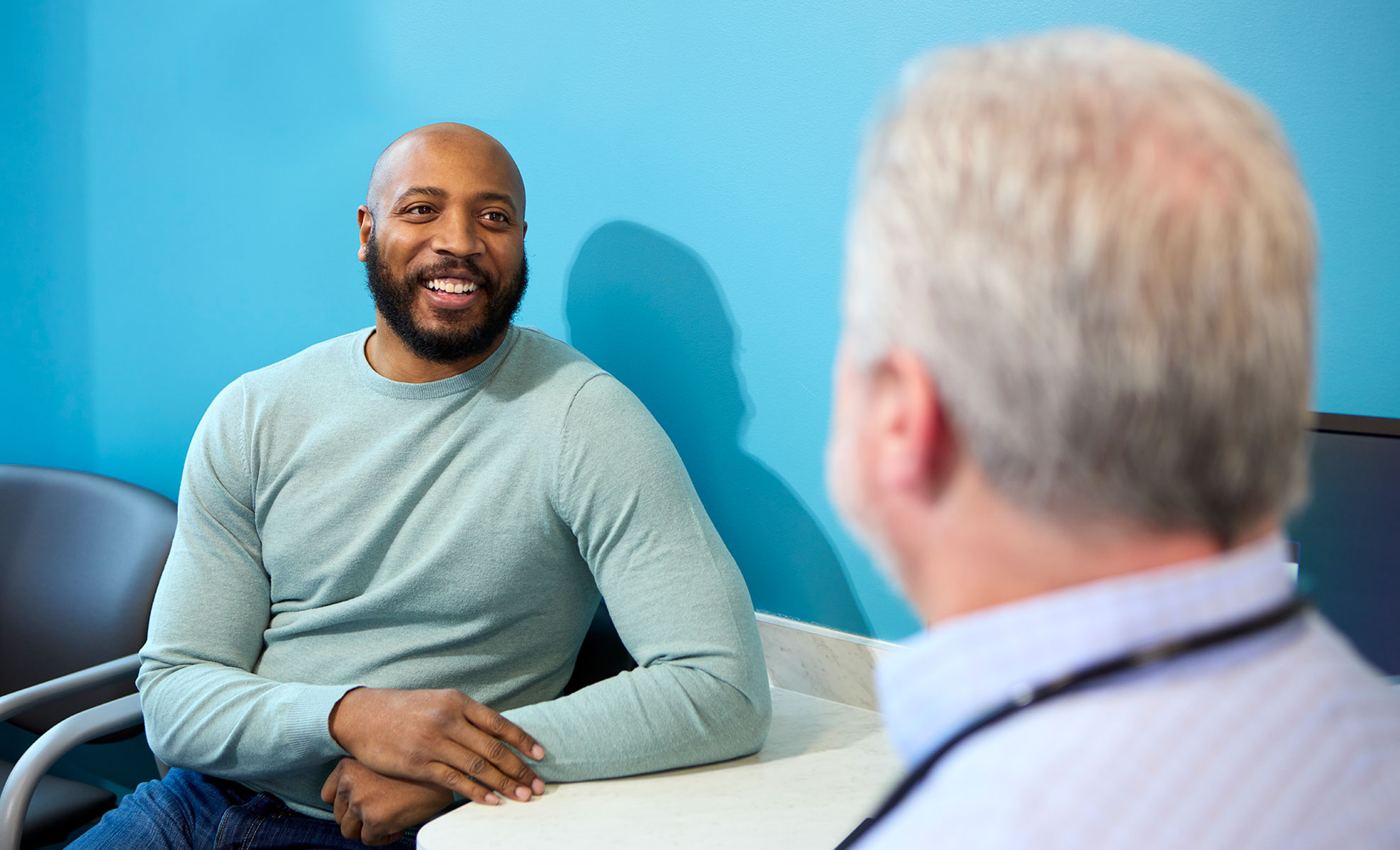 Patient talking with provider during an appointment