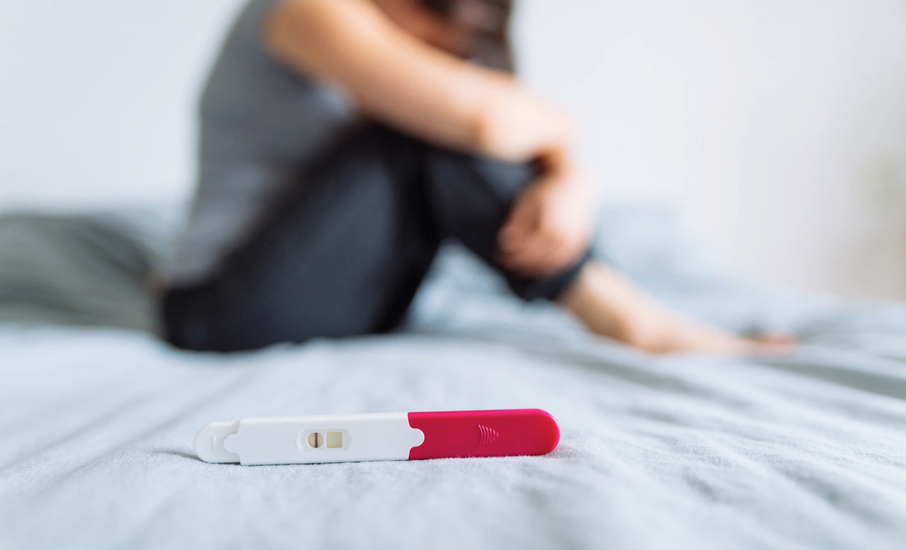 Woman upset with a negative pregnancy test
