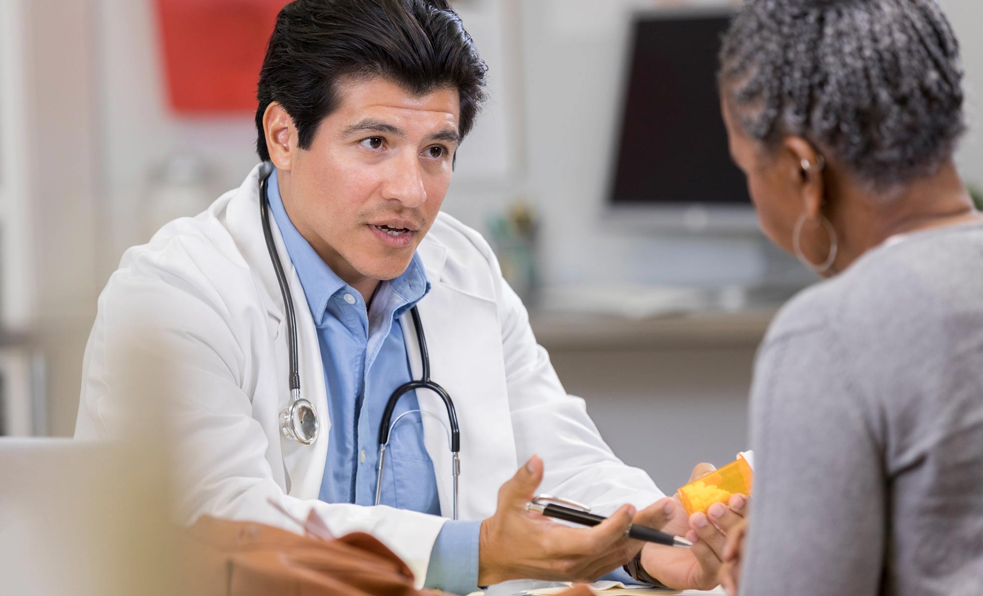 Doctor talking to a patient about a prescription
