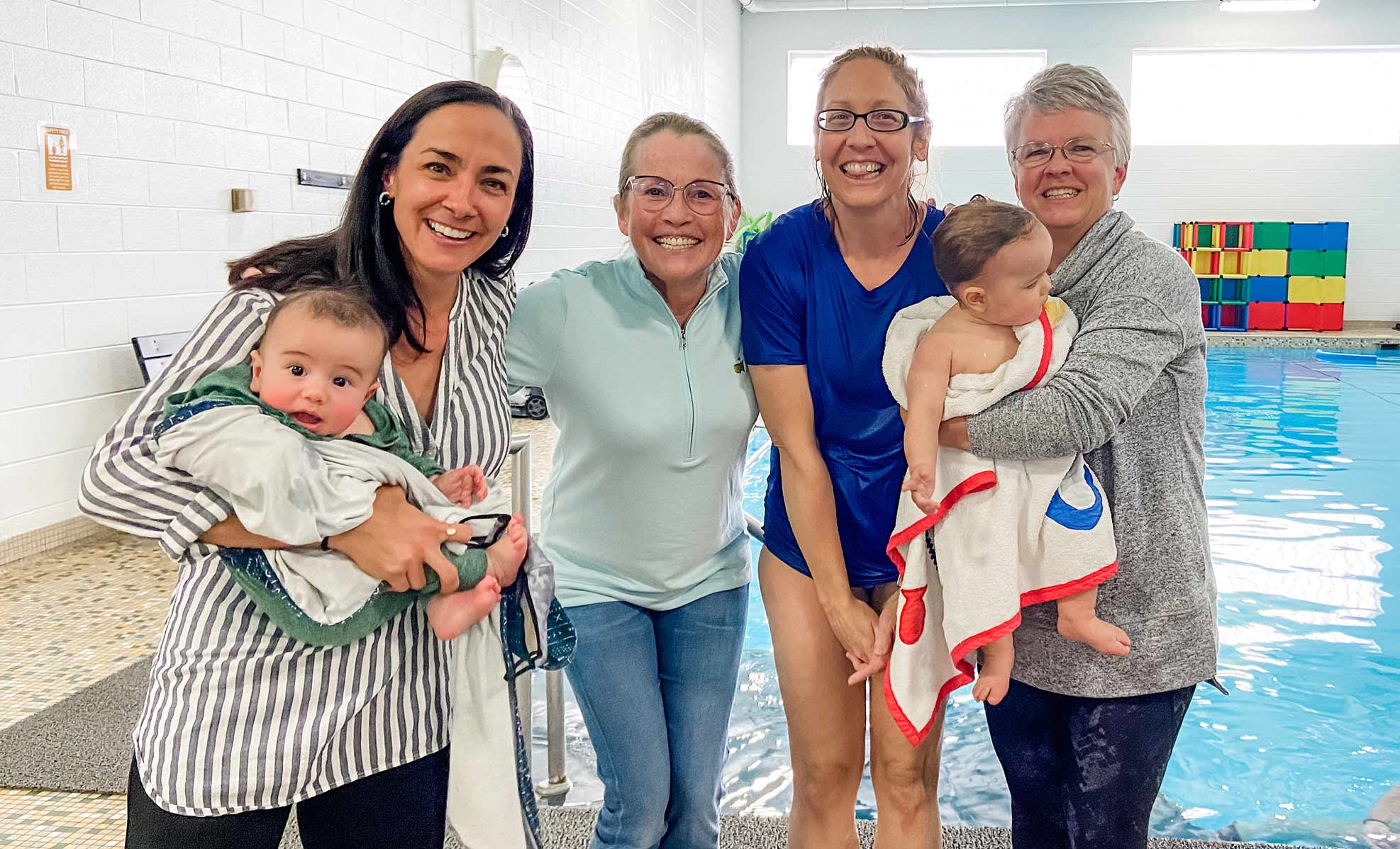 Nicole Hughes and team at the pool