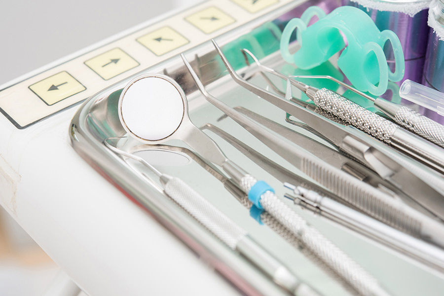 Oral surgeon during a procedure with a patient