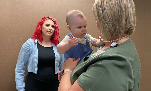 Lisa Patton holding baby Quill