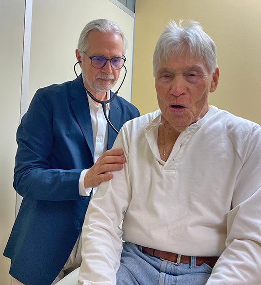 Dr. David Morin with a patient