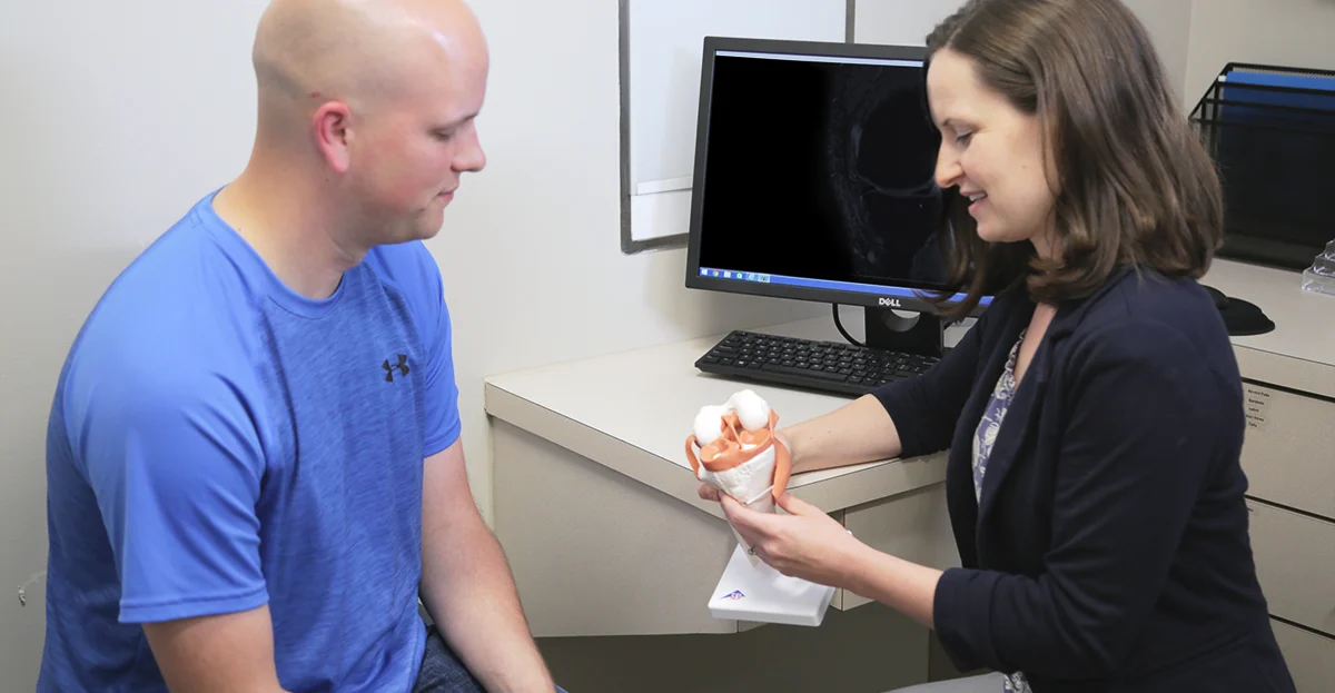 Dr. Remy with patient