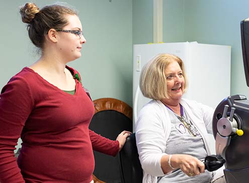 physicial therapist with patient