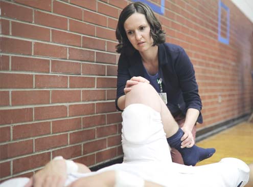 Orthopedic specialist and patient
