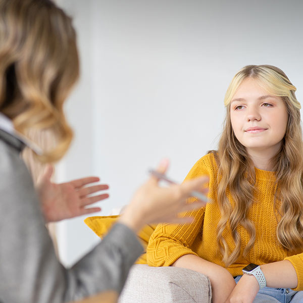 teen female patient with behavior specialist